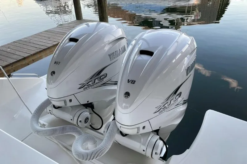 Slide: The Image of Twin Yamaha XTO V8 outboard engines on a 2023 Pursuit S 358 Sport boat. - 16