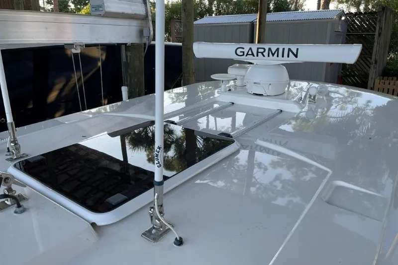 Slide: The Image of 2023 Pursuit S 358 Sport boat with Garmin radar on the roof. - 17