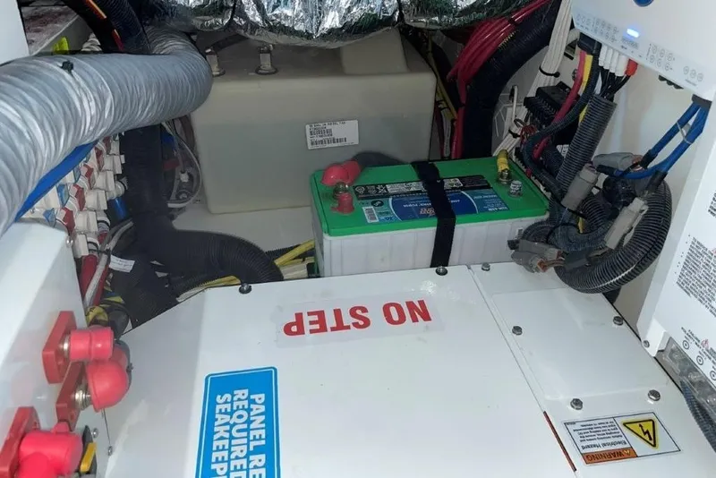 Slide: The Image of Electrical system of 2023 Pursuit S 358 Sport boat with battery and wiring. - 19