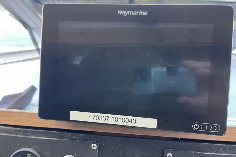 Slide: The Image of Raymarine display on 1972 Whitcraft houseboat dashboard, model E70367. - 3