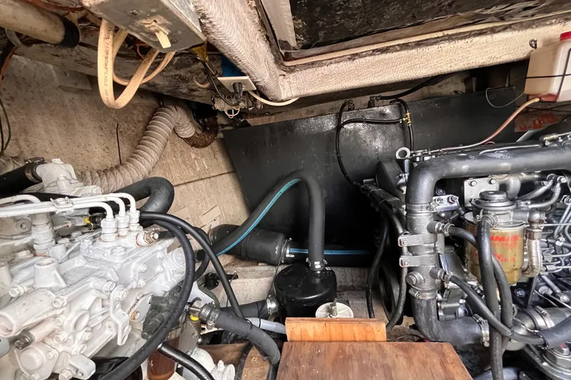 Slide: The Image of Engine room of a 1972 Whitcraft houseboat with visible mechanical components. - 34