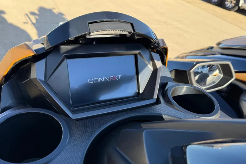 Slide: The Image of 2024 Yamaha WaveRunner FX Limited SVHO dashboard with Connext display and cup holders. - 6