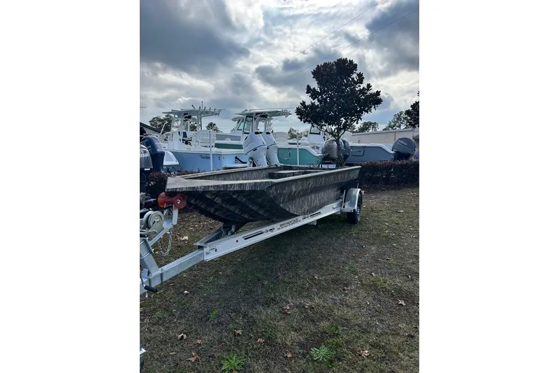 The Image of 2025 Havoc 1756 MRST boat on trailer under cloudy sky. - 0