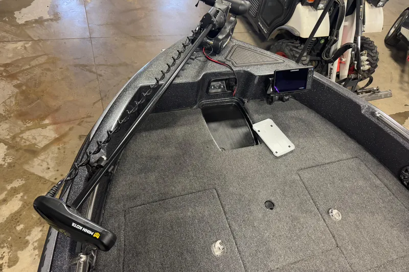 Slide: The Image of 2024 Nitro ZV19 Sport boat interior with trolling motor and navigation system. - 16