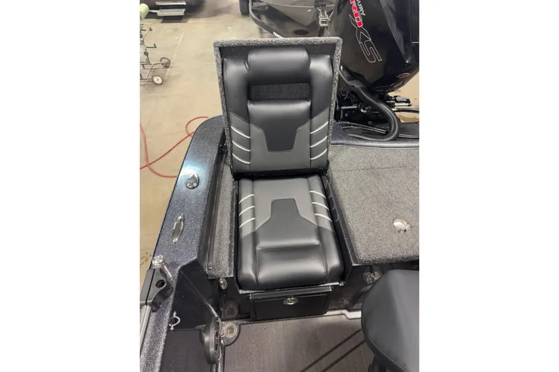 Slide: The Image of 2024 Nitro ZV19 Sport boat seat with sleek black and gray design. - 24