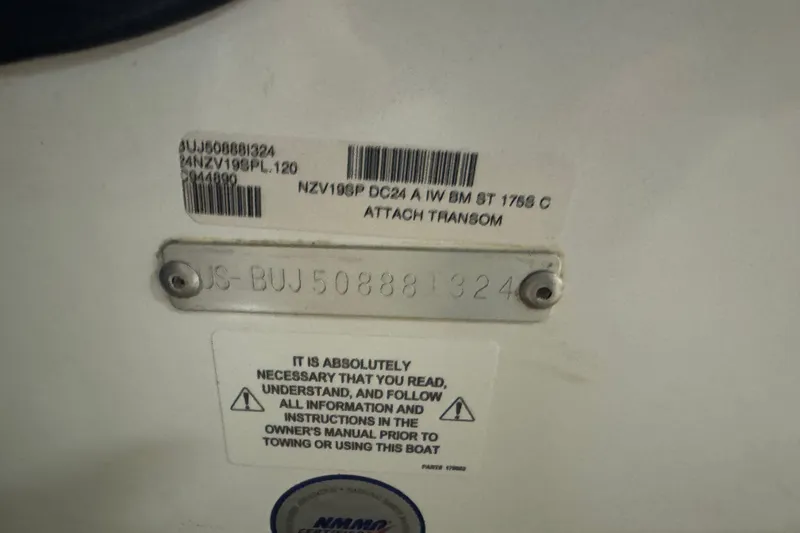 Slide: The Image of 2024 Nitro ZV19 Sport boat identification plate with warning label and serial number. - 5