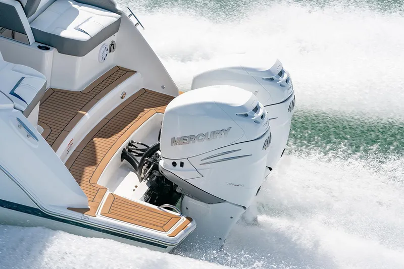 Slide: The Image of Manufacturer Provided Image: 2025 Tiara Yachts 34 LX with dual Mercury outboard engines on water. - 7
