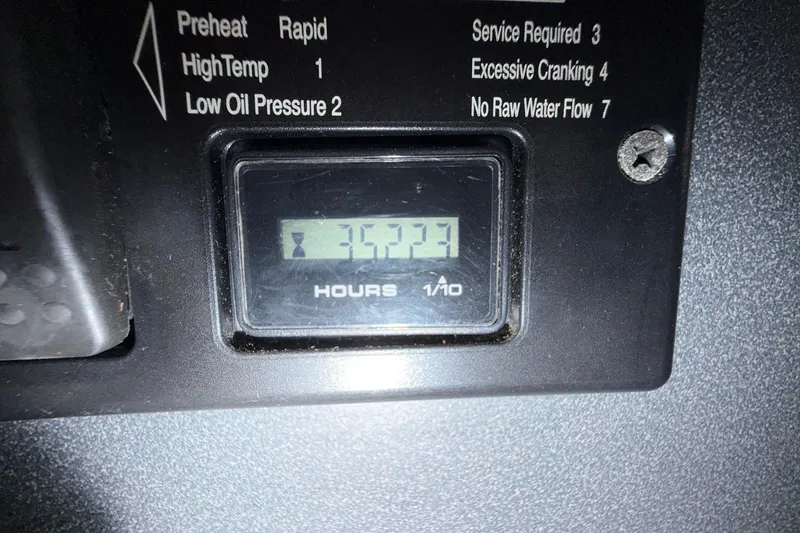 Slide: The Image of Hour meter display on 2004 Beneteau 57 sailboat, showing 3523 hours. - 89