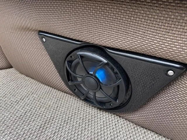 Slide: The Image of Speaker installed in 2024 Regency 250 LE3 boat, featuring blue LED lighting. - 30