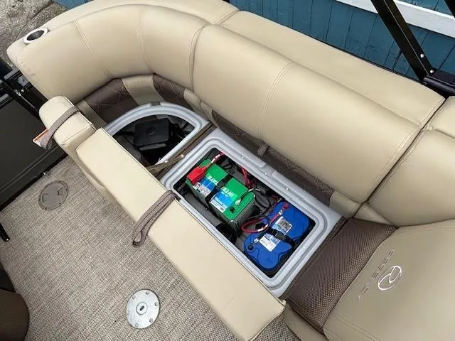 Slide: The Image of 2024 Regency 250 LE3 boat seat storage with batteries and wiring. - 37