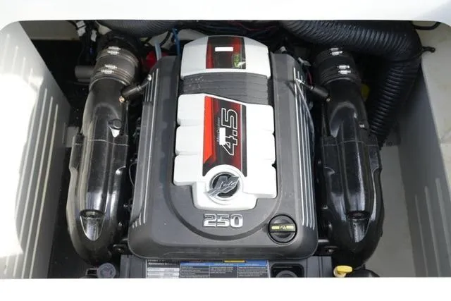 Slide: The Image of Engine of 2022 Sea Ray SPX 210 boat, featuring a 4.5L 250 horsepower motor. - 27
