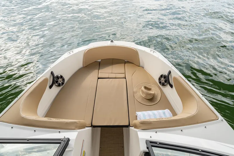 Slide: The Image of Manufacturer Provided Image: 2022 Sea Ray SPX 210 boat with tan seating and water view. - 6