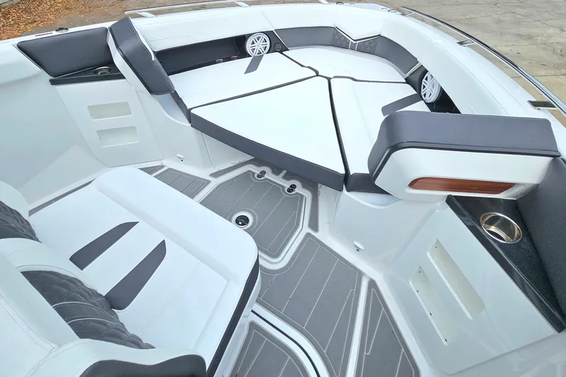 Slide: The Image of Luxurious interior of 2026 Monterey Elite 30 OB boat with stylish seating and modern design. - 20