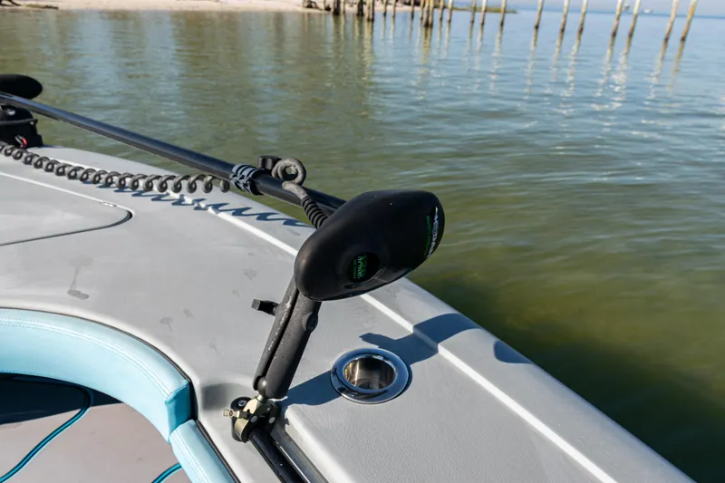 Slide: The Image of 2022 Costa Custom Boats 264 on calm water, featuring a sleek deck design. - 15