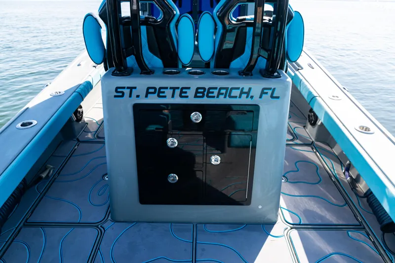 Slide: The Image of 2022 Costa Custom Boats 264 deck with "St. Pete Beach, FL" text, featuring sleek design. - 57