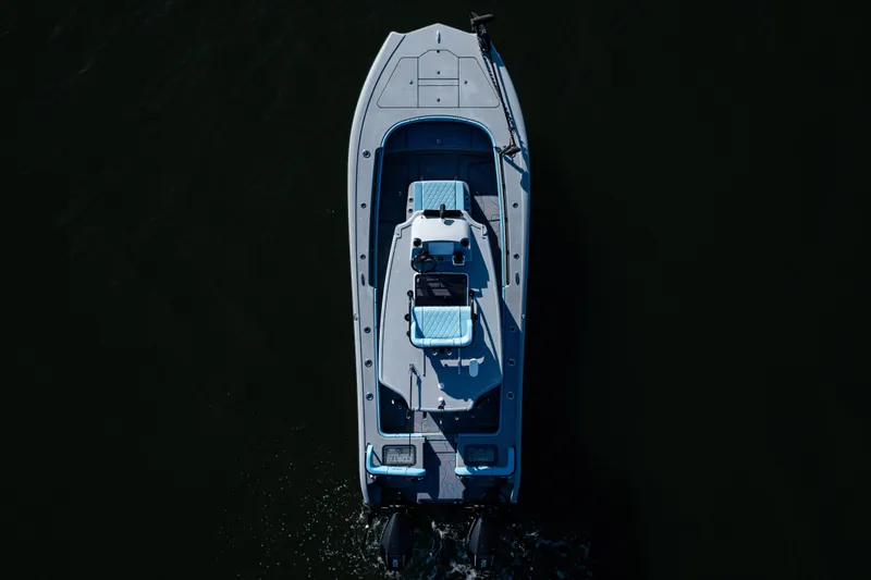 Slide: The Image of Aerial view of 2022 Costa Custom Boats 264 on dark water. - 8