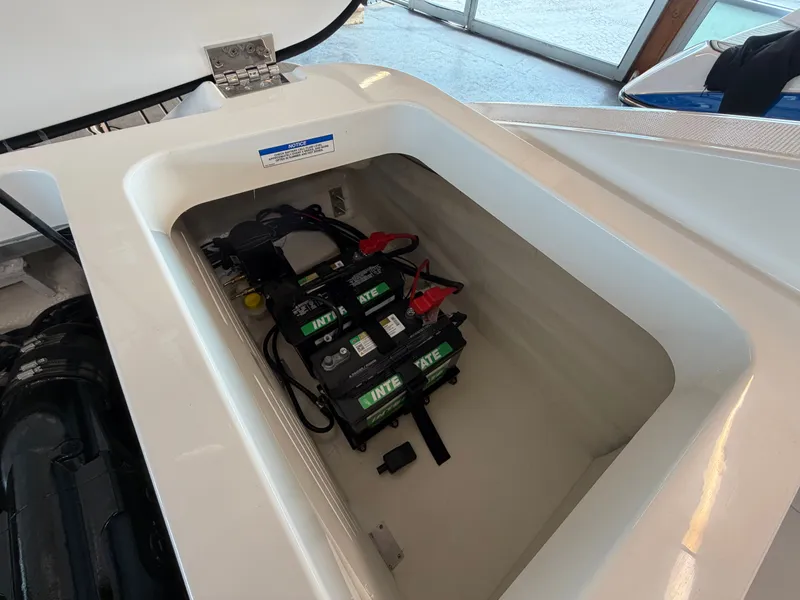 Slide: The Image of Battery compartment of Sea Ray SPX 210 boat, year 2026. - 30