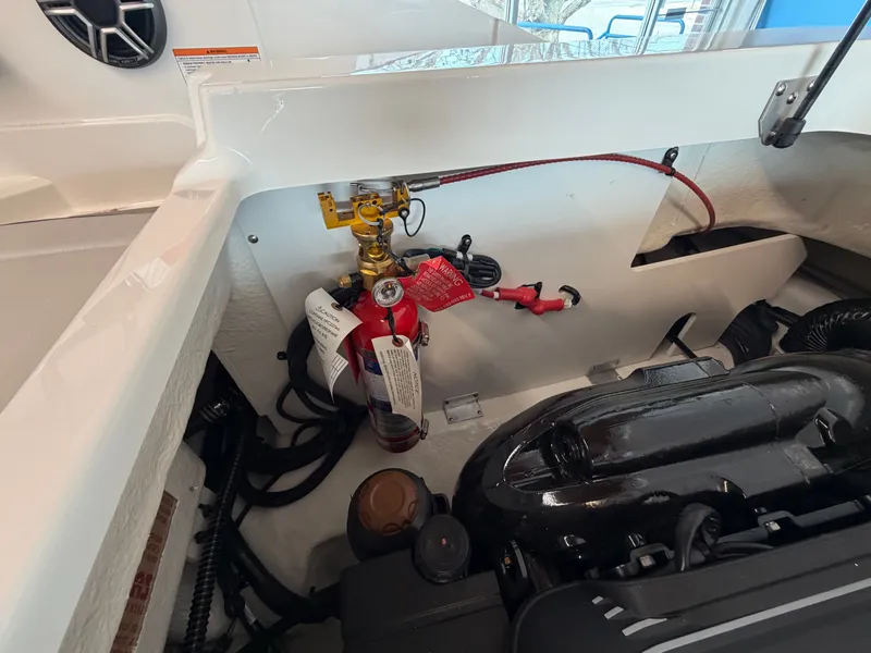Slide: The Image of Engine compartment of 2026 Sea Ray SPX 210 boat with fire extinguisher. - 31