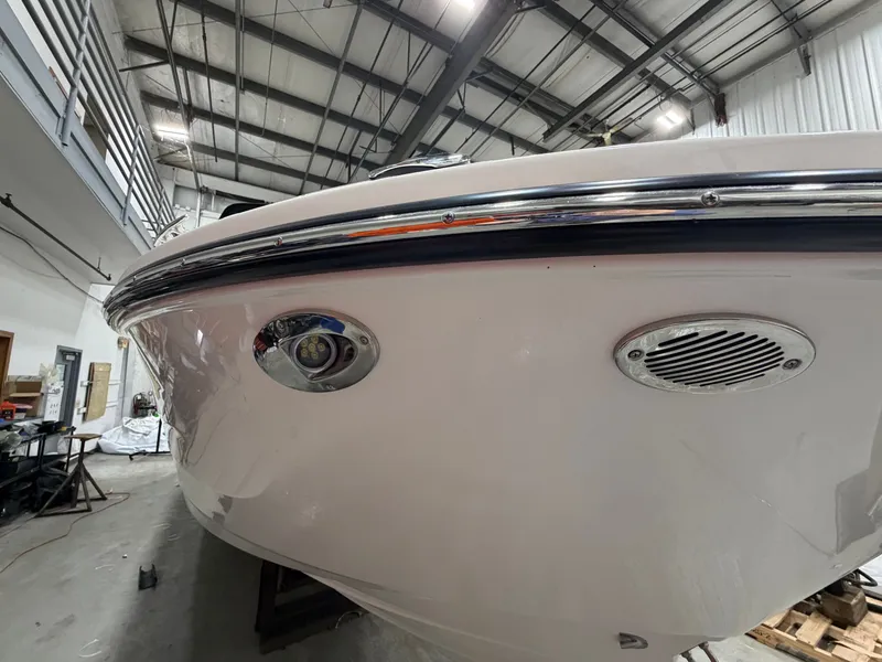 Slide: The Image of Close-up of Sea Ray SDX 270 boat hull, year 2026. - 11