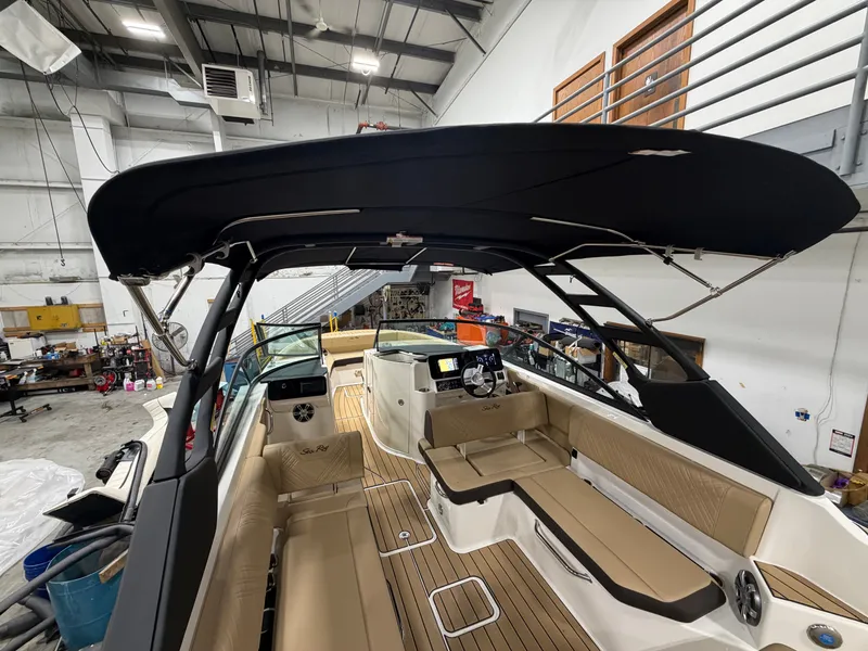 Slide: The Image of Interior view of a 2026 Sea Ray SDX 270 boat in a workshop. - 17