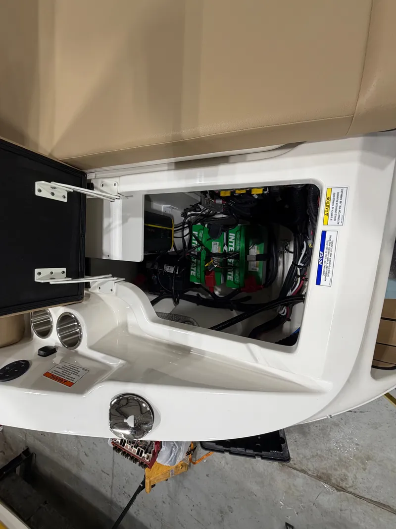 Slide: The Image of View of the engine compartment in a 2026 Sea Ray SDX 270 boat. - 39