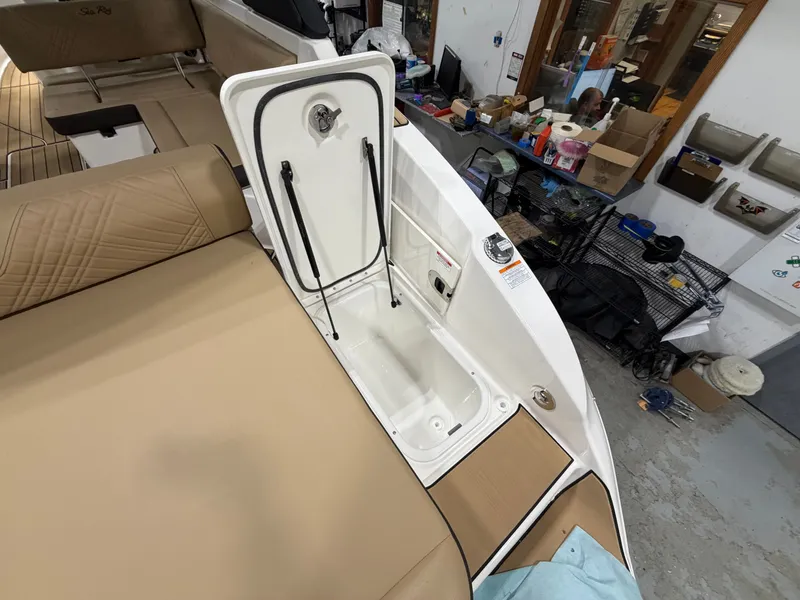 Slide: The Image of Interior of 2026 Sea Ray SDX 270 with storage compartment. - 42