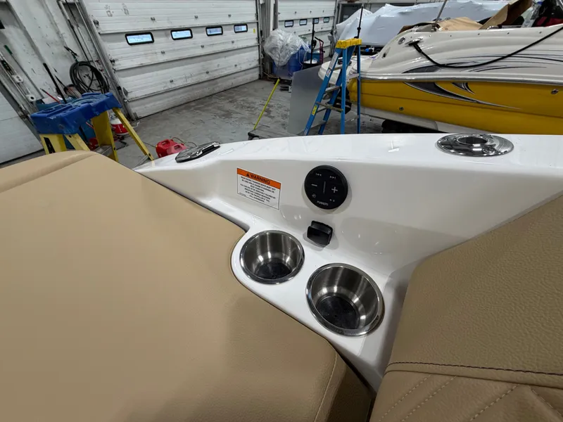 Slide: The Image of Interior of 2026 Sea Ray SDX 270 with cup holders. - 43