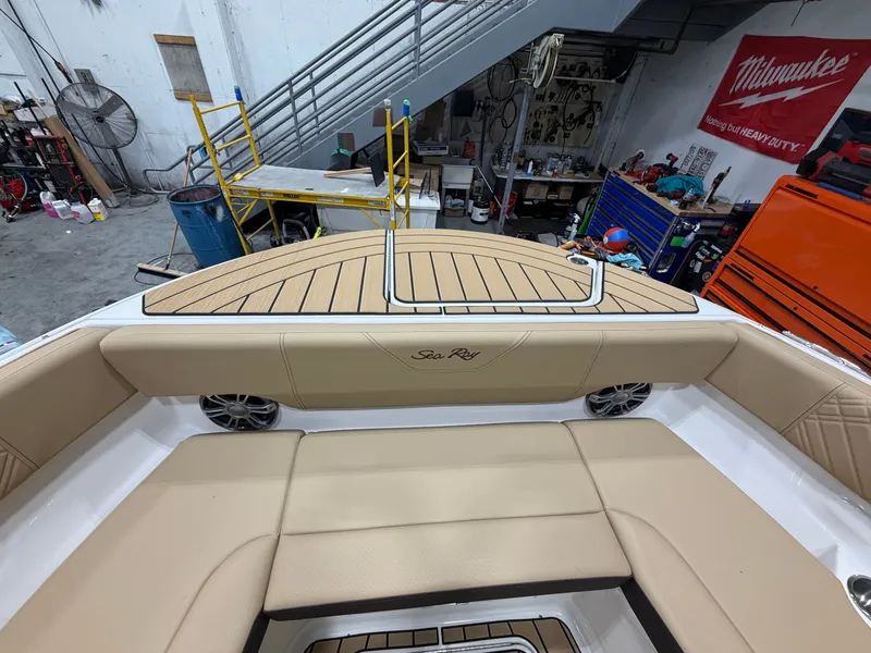 Slide: The Image of Interior of a 2026 Sea Ray SDX 270 with beige seating. - 44