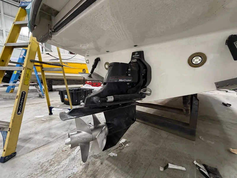 Slide: The Image of Rear view of a Sea Ray SDX 270 boat with MerCruiser drive. - 9