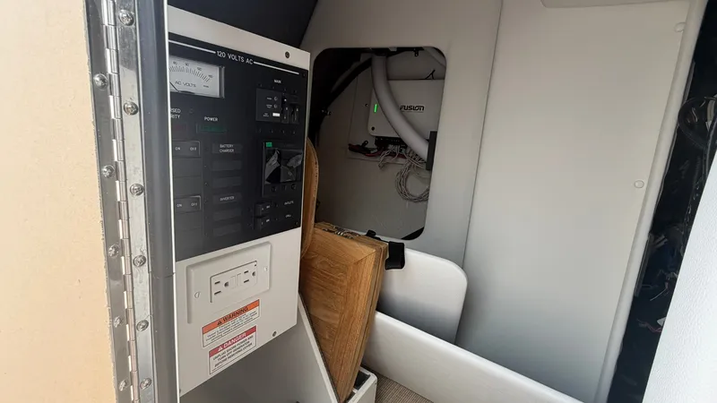 Slide: The Image of Electrical panel and wiring inside a boat cabin. - 27