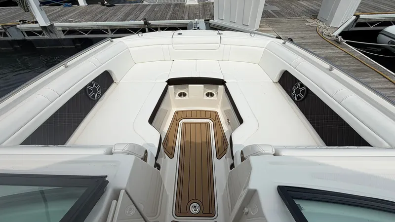 Slide: The Image of The image shows the spacious bow area of a 2026 Sea Ray SDX 290 with sleek seating. - 28