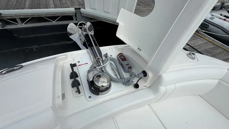 Slide: The Image of The image shows the anchor area of a 2026 Sea Ray SDX 290 boat. - 32