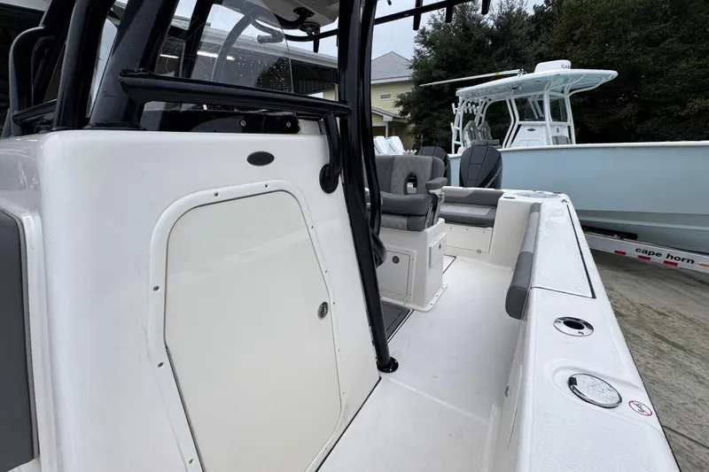 Slide: The Image of 2026 Sea Born LX26 Center Console boat with sleek design and modern features. - 23