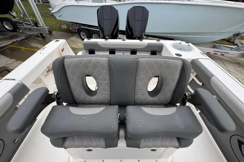 Slide: The Image of 2026 Sea Born LX26 Center Console boat with wet, cushioned seating. - 27