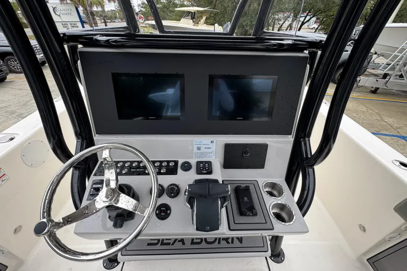 Slide: The Image of 2026 Sea Born LX26 Center Console dashboard with dual screens and steering wheel. - 30