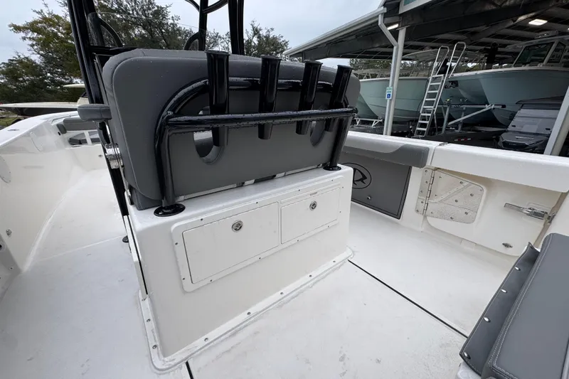 Slide: The Image of 2026 Sea Born LX26 Center Console boat interior with seating and storage compartments. - 35