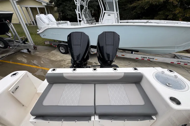 Slide: The Image of 2026 Sea Born LX26 Center Console boat with dual engines and sleek seating. - 38