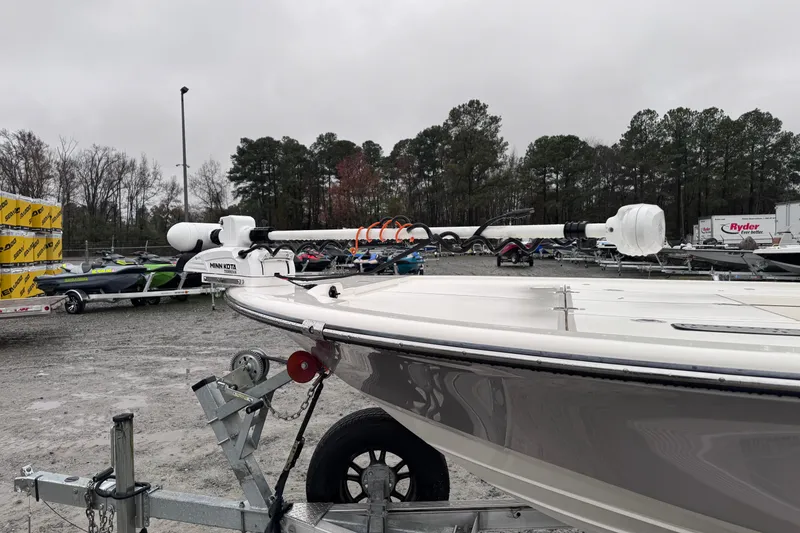 Slide: The Image of 2021 Sea Born FX22 Bay boat on trailer, equipped with Minn Kota trolling motor. - 10