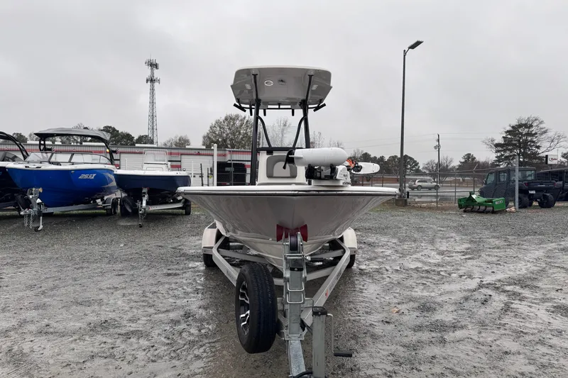 Slide: The Image of 2021 Sea Born FX22 Bay boat on trailer in a dealership lot. - 8