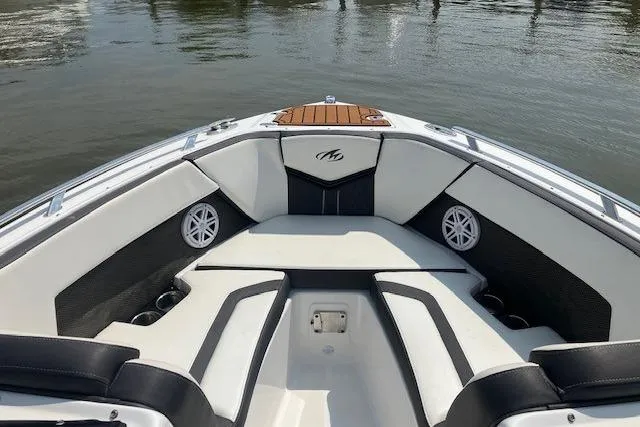 Slide: The Image of 2020 Monterey 238SS Super Sport boat interior with sleek seating and water view. - 5