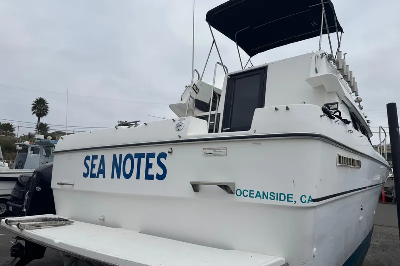 Slide: The Image of 1994 Bayliner 2858 Ciera Command Bridge boat named "Sea Notes" in Oceanside, CA. - 2