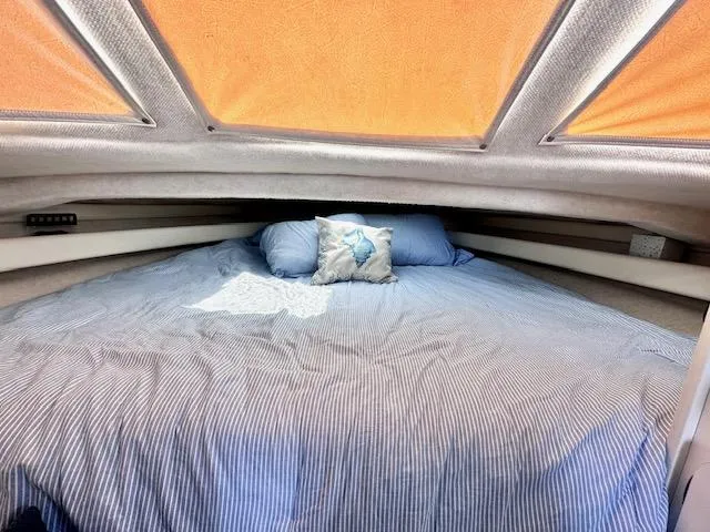 Slide: The Image of Interior of 1994 Bayliner 2858 Ciera Command Bridge with cozy bed. - 30