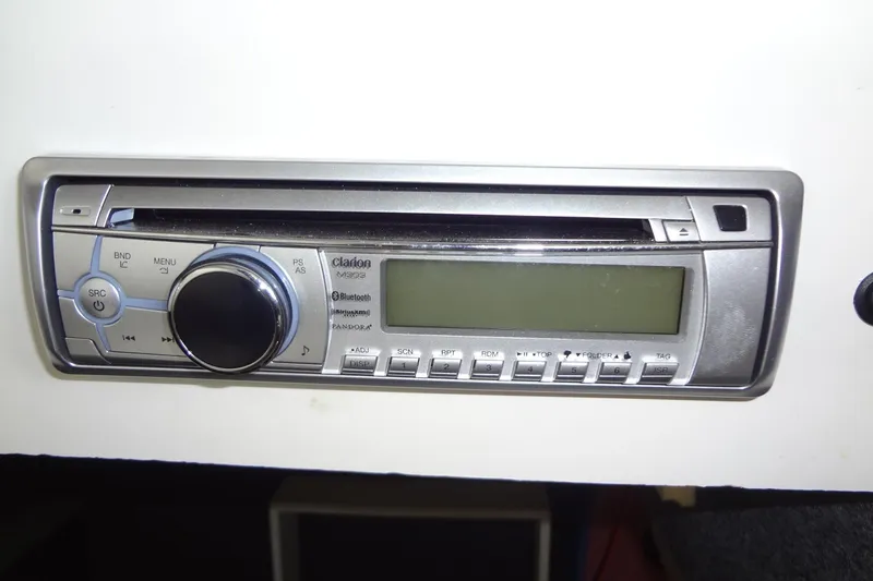 Slide: The Image of Clarion marine stereo system in a 2000 Sea Ray 240 Sundeck boat. - 21