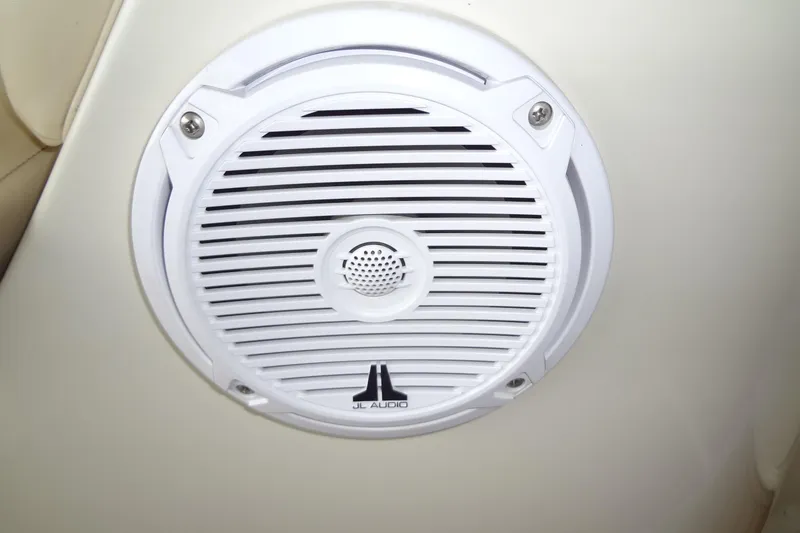 Slide: The Image of JL Audio speaker on 2000 Sea Ray 240 Sundeck boat interior. - 22
