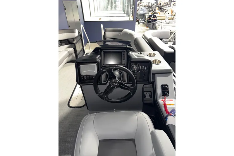 Slide: The Image of 2026 Veranda RELAX VR235VLI boat interior with steering wheel and control panel. - 9