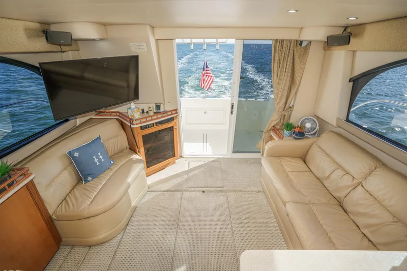 Slide: The Image of Luxurious interior of 2005 Meridian 381 Sedan yacht with leather seating and ocean view. - 15