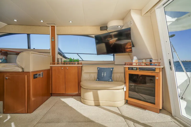Slide: The Image of Luxurious interior of a 2005 Meridian 381 Sedan yacht with plush seating and modern amenities. - 17