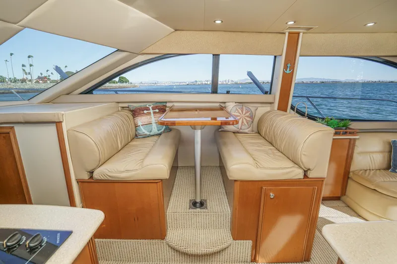 Slide: The Image of Luxurious interior of a 2005 Meridian 381 Sedan yacht with waterfront view. - 21