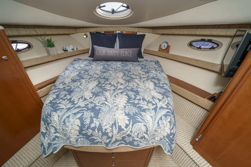 Slide: The Image of Cozy bedroom interior of 2005 Meridian 381 Sedan yacht with floral bedding and decor. - 24