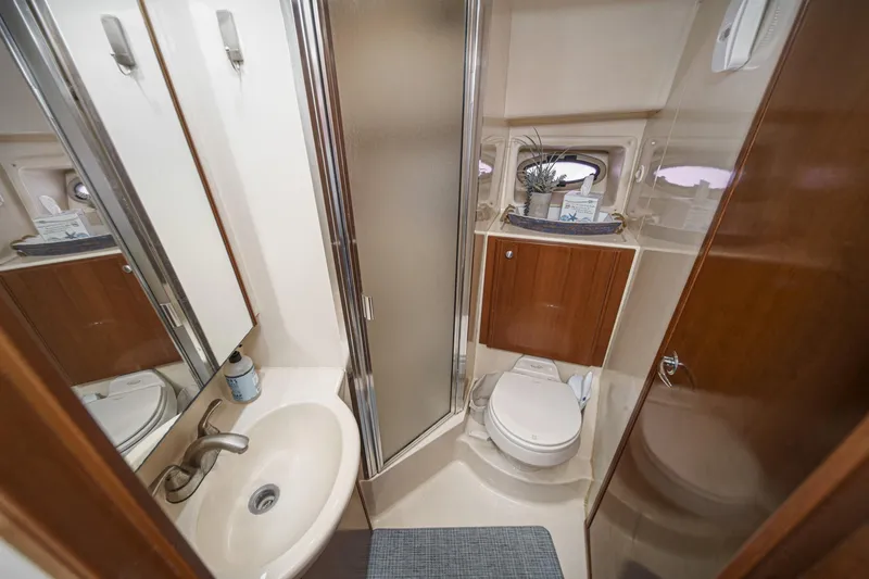 Slide: The Image of 2005 Meridian 381 Sedan bathroom with sink, shower, and toilet. - 25